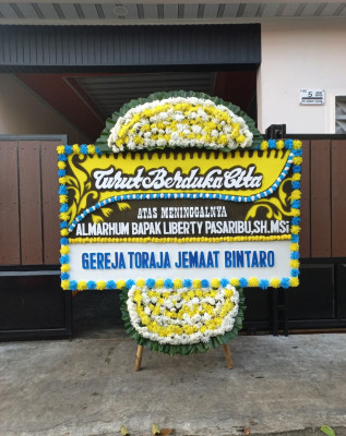 Papan Bunga Duka di Patemon